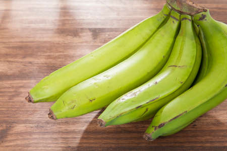 Organic Green Banana Delicious Tropical Fruit - Musa Paradisiacaの写真素材