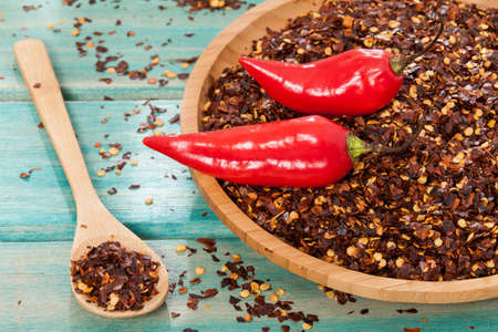 Crushed red cayenne pepper, dried chili and seedsの写真素材