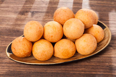 BuÃ±uelo; Traditional Food Colombian - Deep Fried Cheese Bread, Photo On Wooden Background