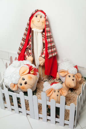 Christmas Decoration - Shepherd And Stuffed Sheep Inside The Corralの写真素材