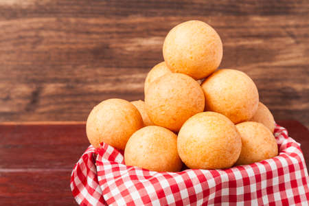 BuÃ±uelo; Traditional Food Colombian - Deep Fried Cheese Bread, Photo On Wooden Background