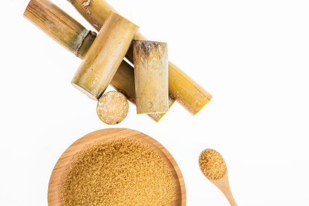 Wooden Dish With Brown Sugar On White Backgroundの写真素材