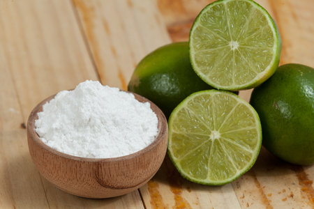 Baking Soda - Sodium Bicarbonate And Lemon, On Wooden Background.の写真素材