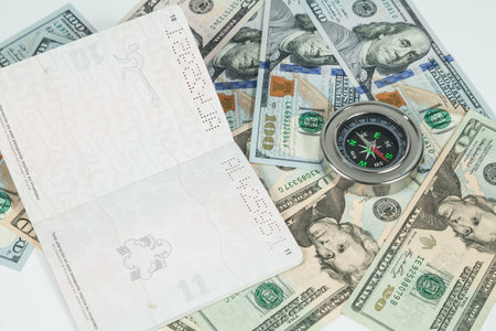 Travel Concept, Colombian Passport With Dollar Bills For Travel Abroad.