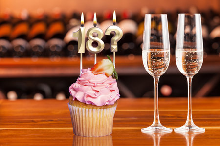 Cupcake With Number For Celebration Of Birthday Or Anniversary; Number 18 And Question Mark.の写真素材