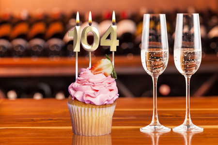 Cupcake With Number For Celebration Of Birthday Or Anniversary; Number 104.の写真素材