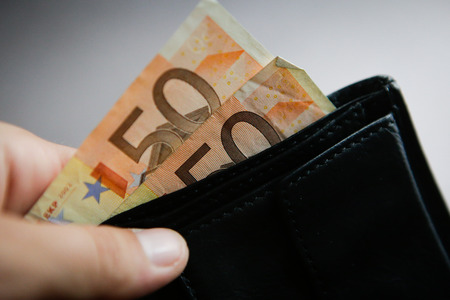 Wallet with 50 euros notesの写真素材