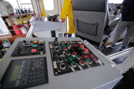 CONSTANTA, ROMANIA - MAY 19, 2018: Tug boat control equipment in the captainâs control cabinのeditorial素材