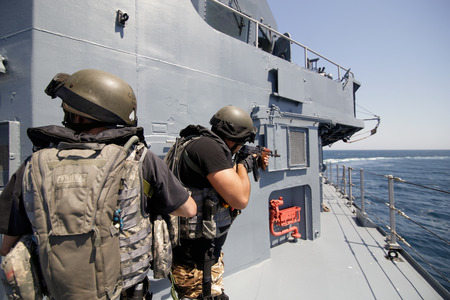 CONSTANTA, ROMANIA - JUNE 20, 2018: Romanian special forces marines get on the deck of â€˜Regele...