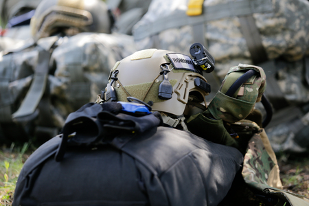 CONSTANTA, ROMANIA - JUNE 23, 2018: Equipment of Romanian military paratroopers lay on the ground...