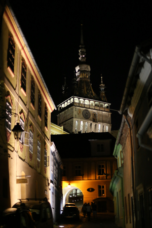 SIGHISOARA, ROMANIA - August 17, 2018: Night scene with the tower clock of the medieval town of Sighisoara, in Transylvania, Romania, in Sighisoara, on August 17のeditorial素材