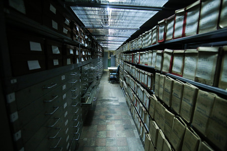 BUCHAREST, ROMANIA - October 31, 2018: Historical archives stacked in a deposit of Romanian National Archives headquartersのeditorial素材