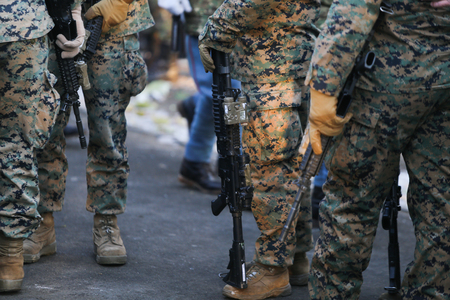 BUCHAREST, ROMANIA - December 1, 2018: US marines take part at the Romaniaâs National Day military parade, in Bucharest.のeditorial素材