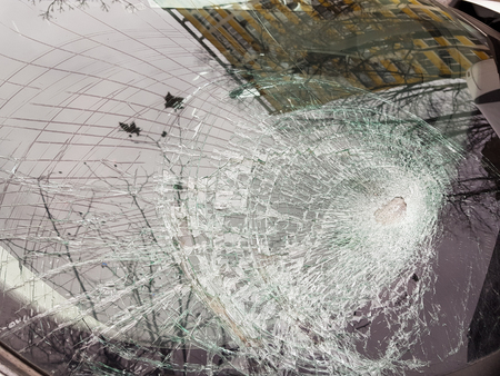 Broken car windshield after a road accidentの写真素材