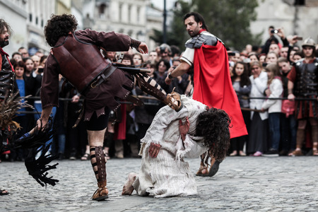 Bucharest, Romania - April 15, 2014: Dramatisation by actors of the Passion of Christ - drama, torture and crucifixion of Jesus Christ by the Romans.のeditorial素材