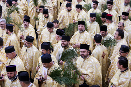Bucharest, Romania - April 20, 2019: Romanian Orthodox priests during a Palm Sunday pilgrimage procession in Bucharestのeditorial素材