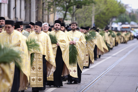 Bucharest, Romania - April 20, 2019: Romanian Orthodox priests during a Palm Sunday pilgrimage procession in Bucharestのeditorial素材