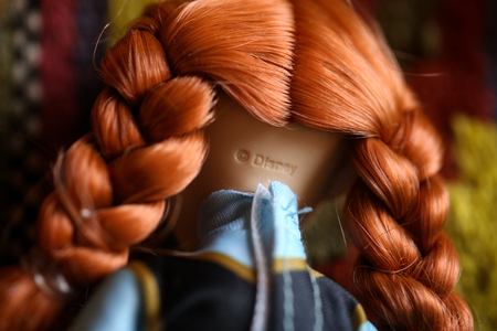 Pitesti, Romania - April 30, 2019: Details with the Disney brand logo on the back of a doll (Anna from Frozen).のeditorial素材