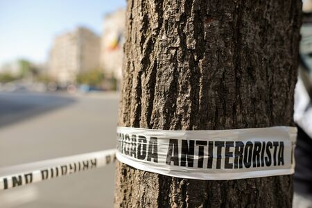 Bucharest, Romania - September 22, 2019: Crime scene ribbon that reads in Romanian Counter-terrorism Brigade, of the Romanian Intelligence Service, during a terrorism exercise (drill).のeditorial素材