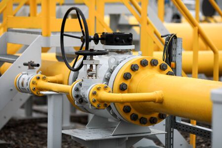 Industrial equipment (pipes, manometer/pressure gauge, levers, faucets, indicators) in a natural gas...