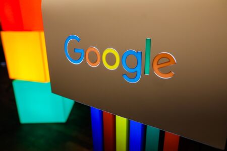 Bucharest, Romania - December 10, 2019: Shallow depth of field (selective focus) image with the Google logo and Google colors during a press event.のeditorial素材