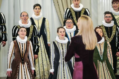 Bucharest, Romania - January 14, 2019: Members of the Romanian Madrigal Choir (Corul Madrigal) perform in the Cotroceni Palace.のeditorial素材