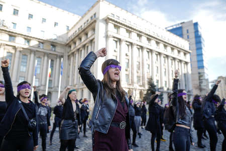 Bucharest, Romania - March 1, 2020: Women take part at a feminist flashmob in downtown Bucharest.のeditorial素材