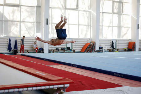 Bucharest, Romania - February 12, 2020: Romanian male gymnast trains in the Lia Manoliu gym training...