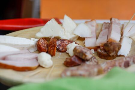 Shallow depth of field (selective focus) image with traditional Romanian meat products, mostly from pork, on display in a market.の写真素材