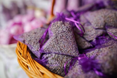 Shallow depth of field (selective focus) image with lavender in bags on sale in a traditional Romanian market.の写真素材