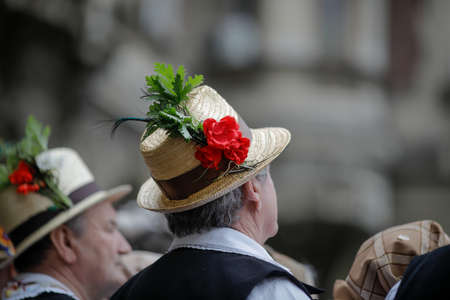 Bucharest, Romania - March 5, 2020: Details with the traditional Romanian straw hat of a senior man,...