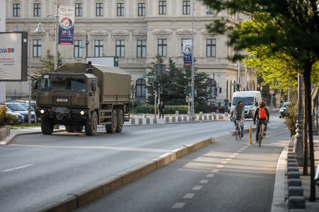 Bucharest, Romania - April 22, 2020: Romanian army truck in downtown Bucharest during the covid-19 lockdown.のeditorial素材