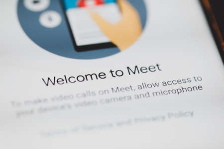 Bucharest, Romania - April 30, 2020: Shallow depth of field (selective focus) and macro image with the Google Meet mobile application.のeditorial素材