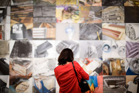 Bucharest, Romania - June 10, 2020: A woman is looking at an art exhibit in the National Museum of Contemporary Art.のeditorial素材