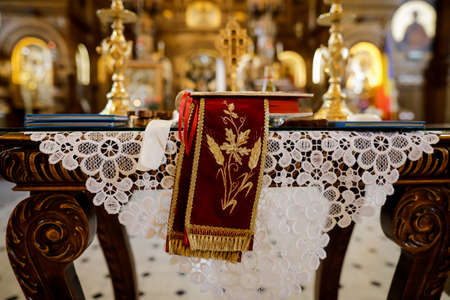 Bucharest, Romania - May 24, 2020: Details with accessories in an Orthodox Church needed for an Orthodox baptism. Baptismal font.のeditorial素材