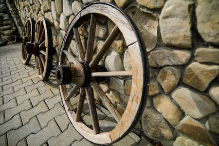Old wooden cart wheelsの写真素材
