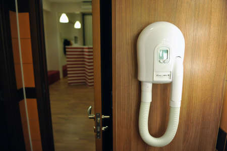 Details with the hair dryer in a gym locker.の写真素材