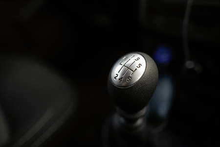 Details with a gear shift knob of a manual gearbox car