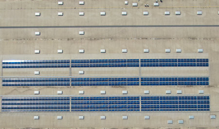 Aerial image of industrial solar panels on the roof of a hypermarket.の写真素材
