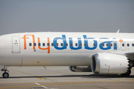 Otopeni, Romania - August 1, 2021: Fly Dubai commercial airline passenger airplane on the Henri...