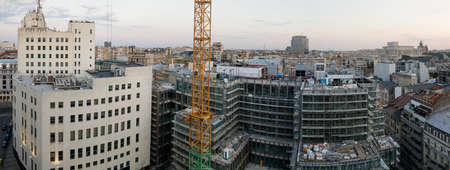 Bucharest, Romania - August 13, 2021: Overview of the old part of Bucharest during a summer sunset. New and old buildings together.のeditorial素材