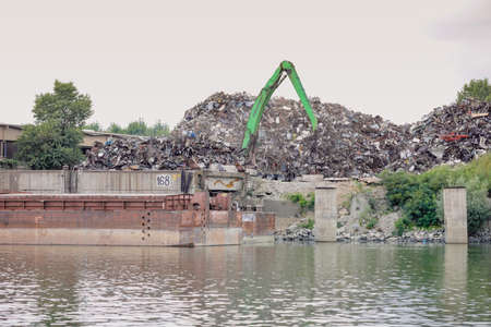 Braila, Romania - August 26, 2021: Metal scrapyard on the banks of the Danube river.