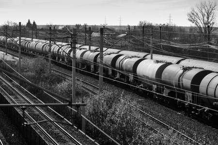 Oil, gas and liquefied petroleum gas (LPG, LP gas, or condensate) freight train wagons in a station near Bucharest, Romania.の写真素材