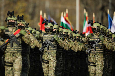 Bucharest, Romania - 1 December, 2021: Romanian army special forces soldiers march during the...
