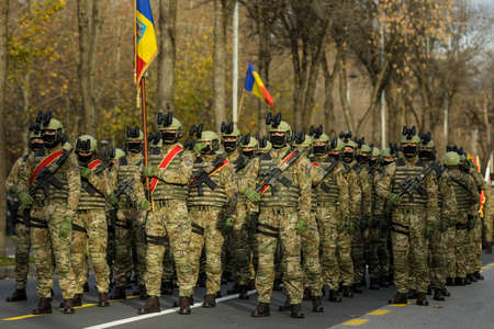 Bucharest, Romania - 1 December, 2021: Romanian army special forces soldiers prepare for the Romanian national day military parade.のeditorial素材