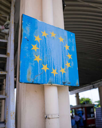 Shallow depth of field (selective focus) image with a worn out and rusty sign at the Romanian border...