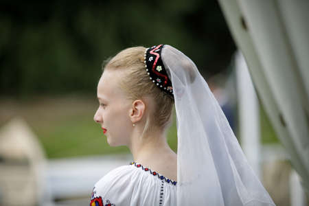 Braila, Romania - August 26, 2021:Shallow depth of field (selective focus) details with a girl...