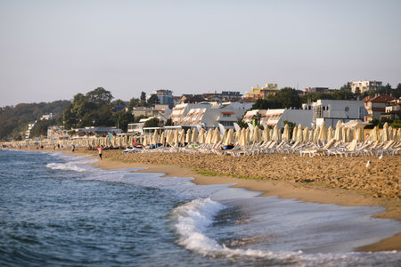 Obzor, Bulgaria - August 18, 2021: The beach, sand and hotels on a calm and warm summer morning at...
