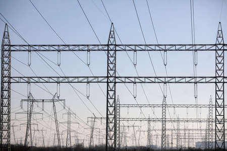 High voltage transmission lines on metallic poles in Bucharest, Romania.