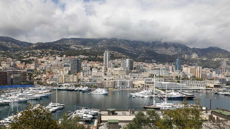 Monaco - April 19, 2022: Overview with the Monaco city and port during a spring sunny day.のeditorial素材